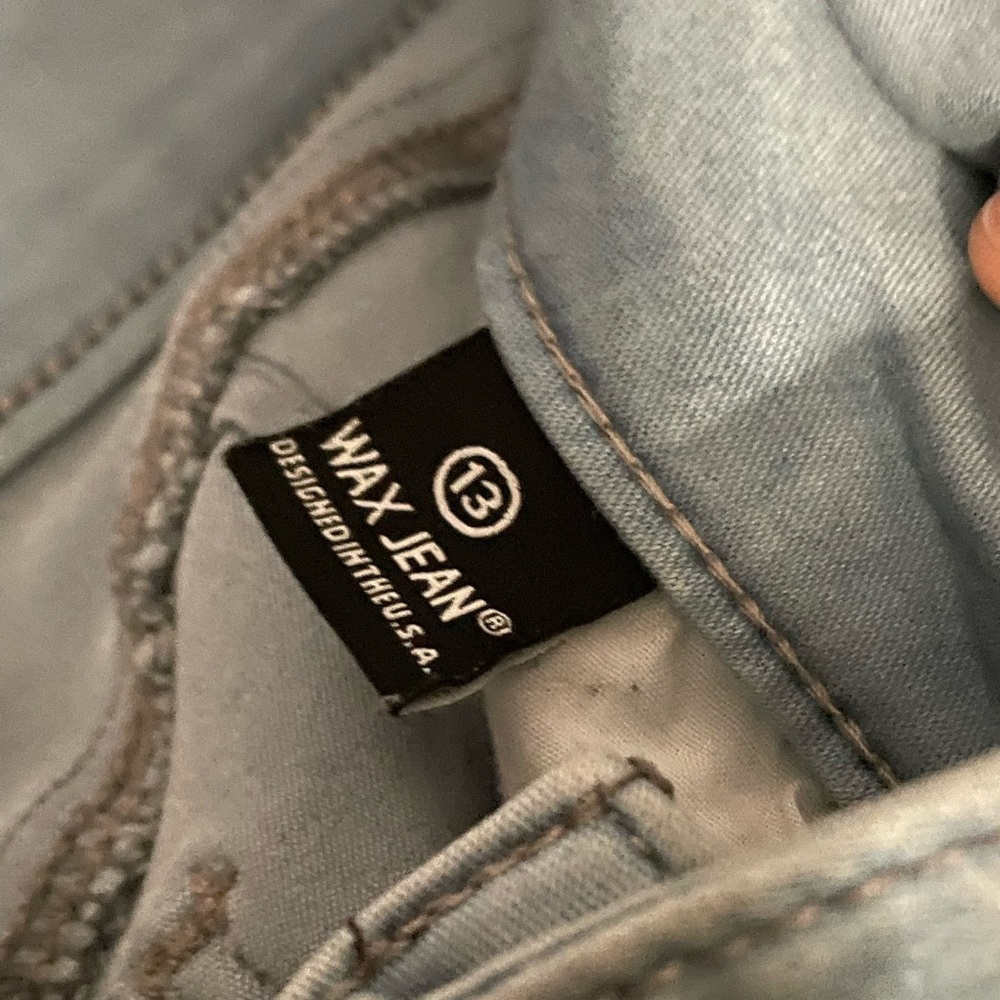 The color of the jeans are a sky blue